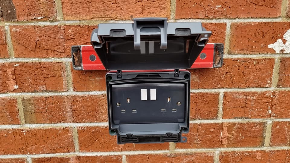 Outdoor electrical socket installation and testing
